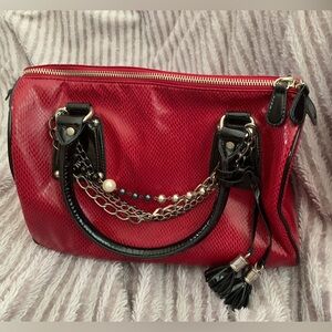 Elegant Red Handbag with Chain Detail